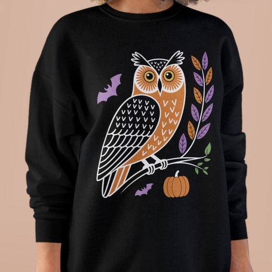 Black sweatshirt with an owl design 